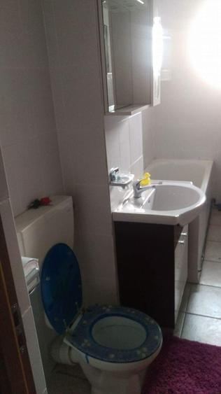 Garsonieră decomandată în Titan