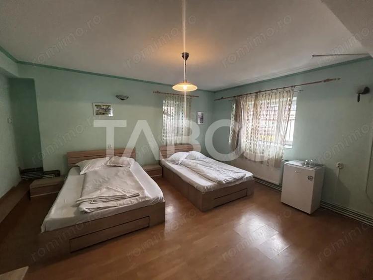 Casă cu 5 camere cu Teren 250 Mp în Cisnădioara