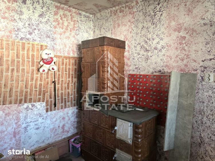 Casă cu 4 camere semidecomandat cu Teren 1440 Mp în Central