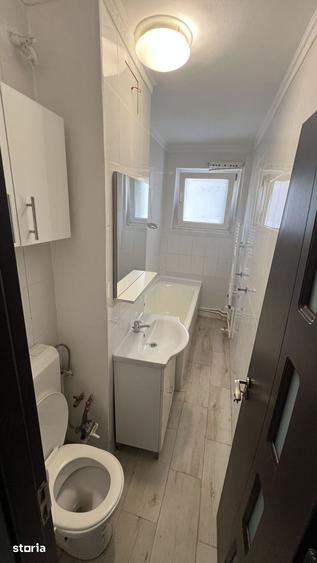 Garsoniera cu centrala proprie in bloc mixt reabilitat Gorjului - 10