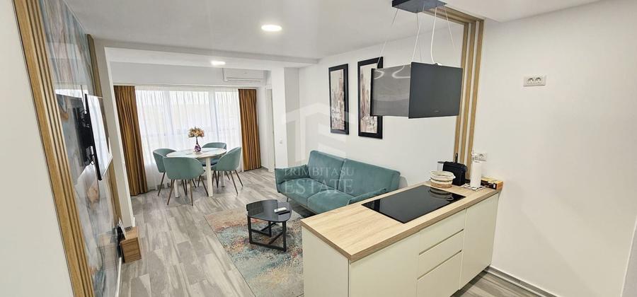 Apartament cu 3 camere semidecomandat, mobilat în Central