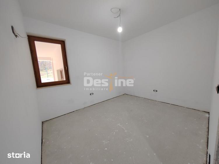 Casă cu 4 camere cu Teren 1000 Mp în Bucium