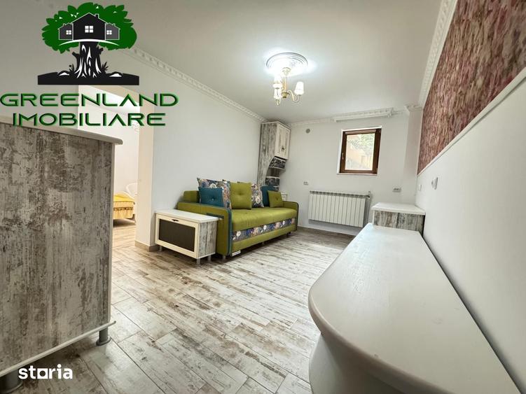Apartament cu 7 camere decomandat în Bucium