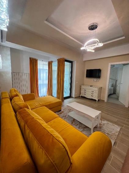 Apartament cu 2 camere semidecomandat, mobilat în Central