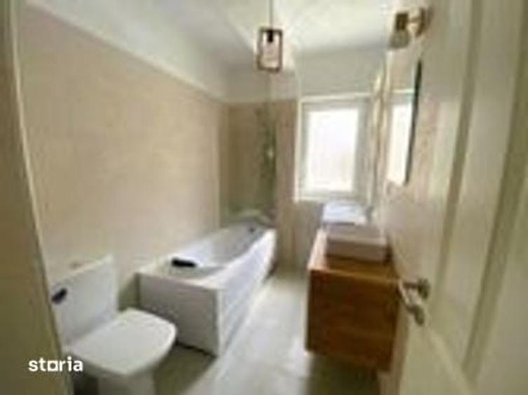 Apartament la vila, 3 camere+bucatarie si curte 100 mp - 1