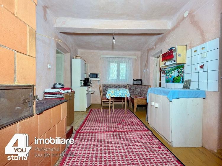 Casă cu 4 camere cu Teren 1459 Mp în Secusigiu