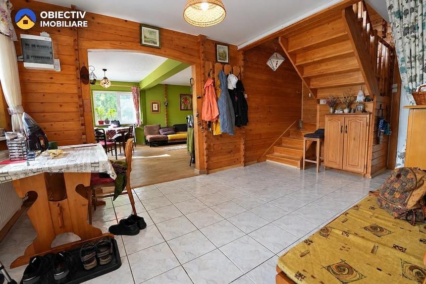 Casa din lemn P+M 191 mp, teren 2.199 mp, Almas - Garcina, zona retrasa - 19