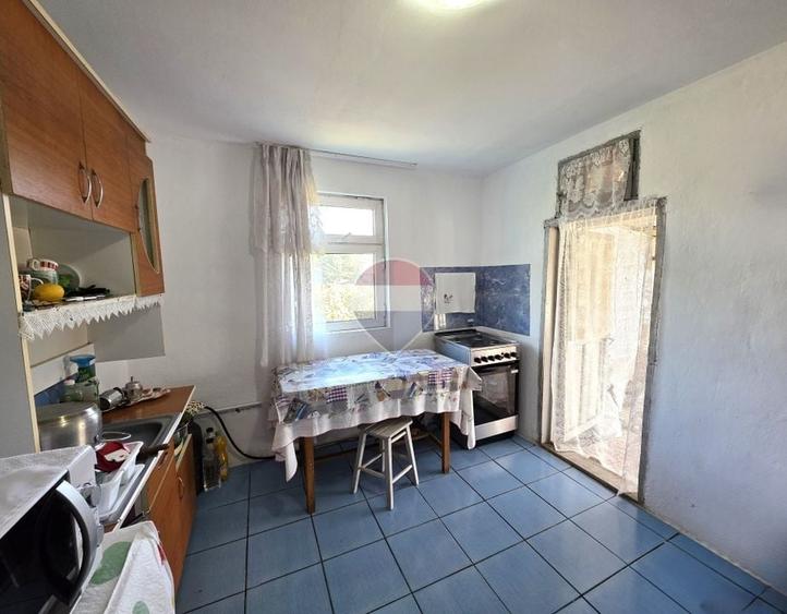 Casă individuală cu 5 camere cu Teren 1098 Mp în Oreavul