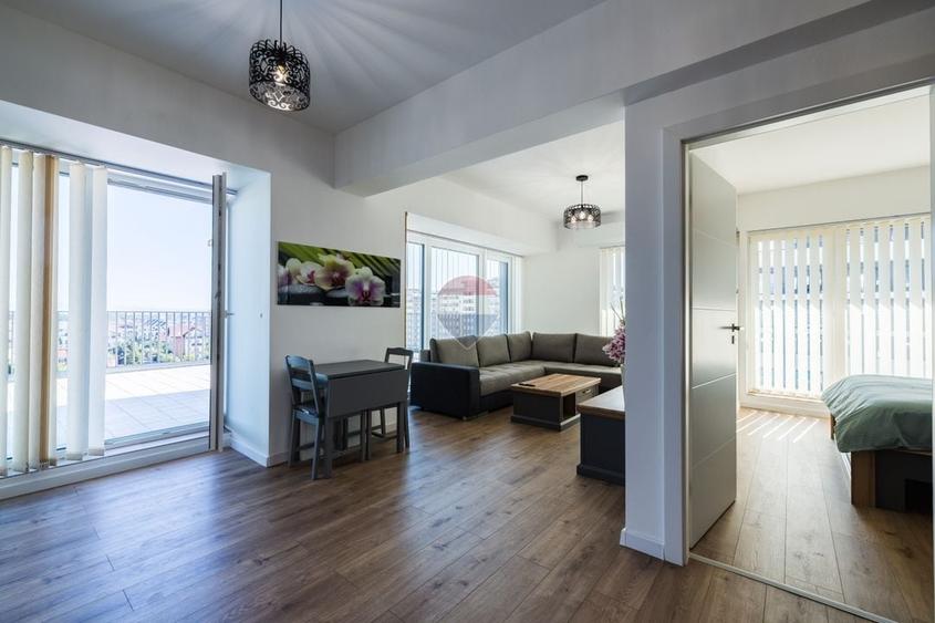Apartament cu 2 camere decomandat, mobilat în Tractorul