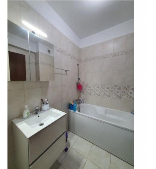 Apartament cu 2 camere decomandat în Tineretului — fotografia 2