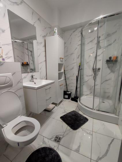 Apartament cu 2 camere semidecomandat, mobilat în Central
