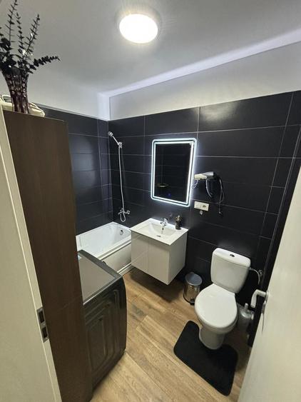 Apartament cu 3 camere decomandat în Cățelu