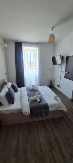 Apartament cu 2 camere semidecomandat, mobilat în Central
