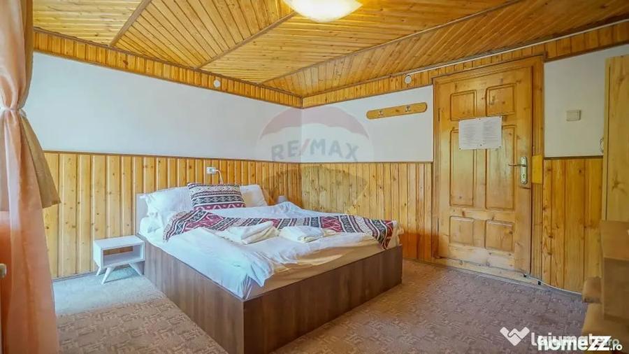 Casă cu 10 camere cu Teren 1137 Mp în Moieciu