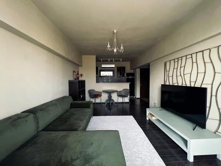 Apartament cu 2 camere semidecomandat, mobilat în Romană