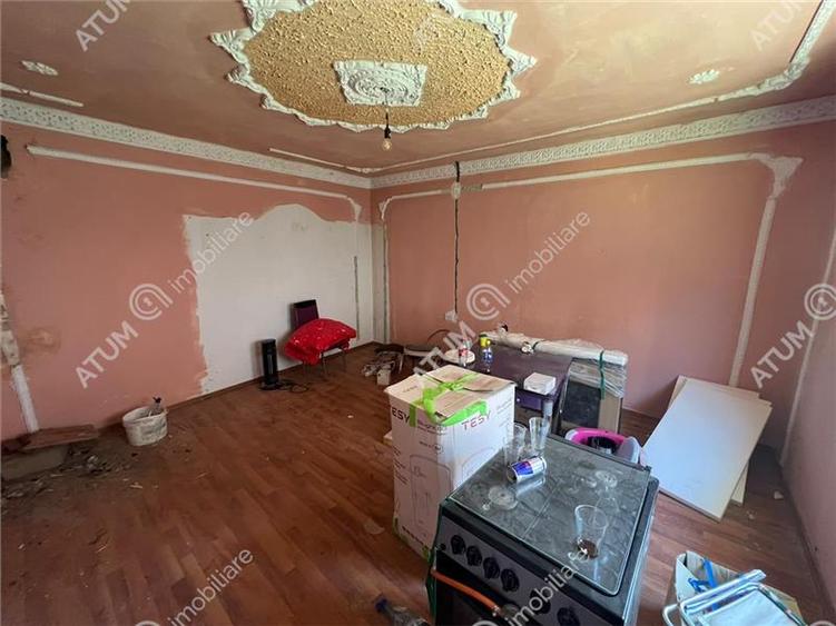 Casă individuală cu 5 camere cu Teren 489 Mp în Central
