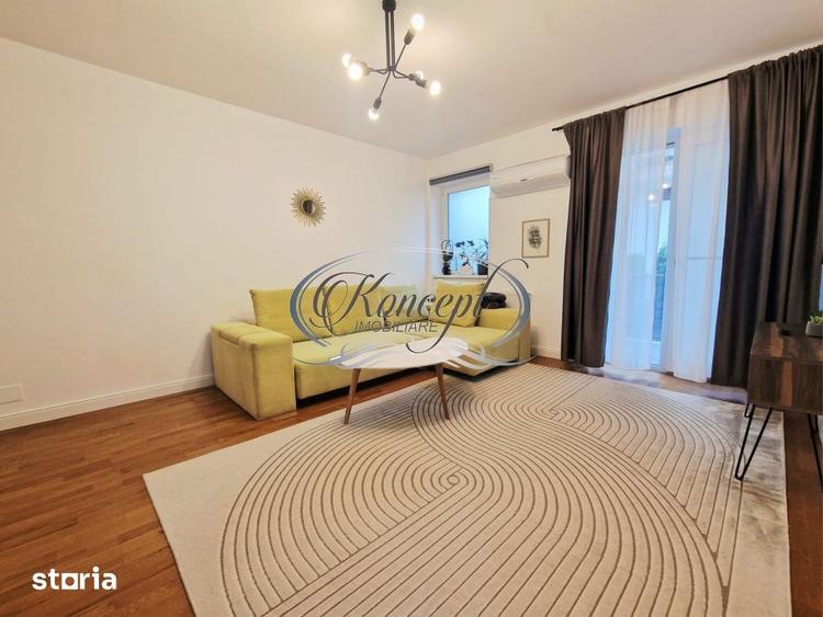 Apartament cu 2 camere semidecomandat, mobilat în Borhanci