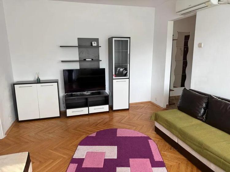 Apartament cu 2 camere semidecomandat, mobilat în Podu Roș