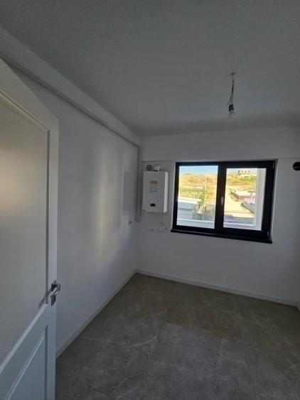 Apartament cu 2 camere decomandat în Bucium