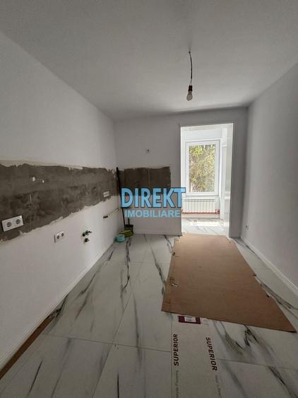 Apartament cu 4 camere decomandat în Central