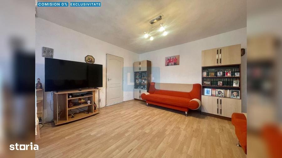 Apartament cu 3 camere semidecomandat în Micro IV