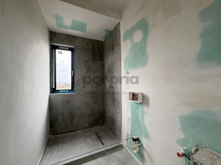 Casă individuală cu 4 camere cu Canalizare în Sânpetru