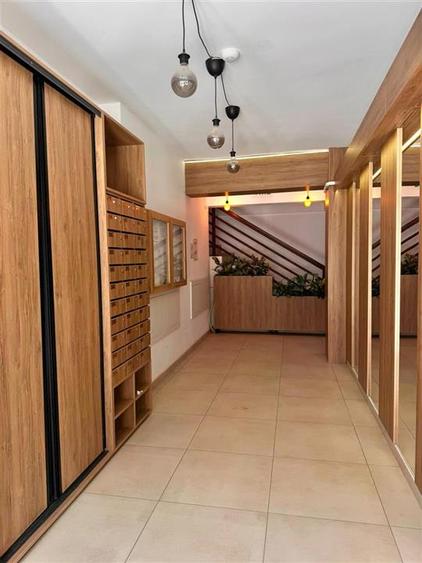 Apartament cu 2 camere decomandat în Tractorul