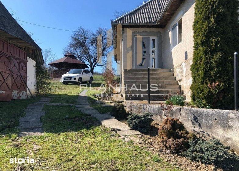 Casă cu 3 camere cu Teren 2700 Mp în Băsești