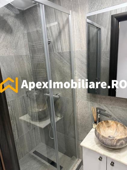 Apartament cu 4 camere decomandat în Titan