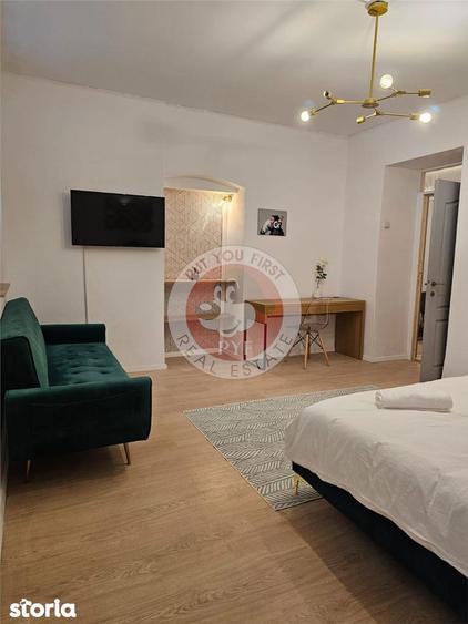 Apartament cu 4 camere decomandat în Romană