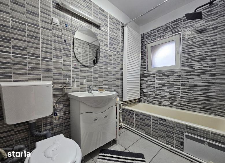Apartament cu 3 camere semidecomandat în Eminescu
