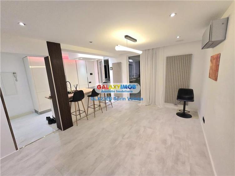 Apartament cu 4 camere semidecomandat, mobilat în Titan