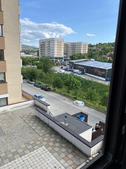 Apartament cu 2 camere, mobilat în Bucium