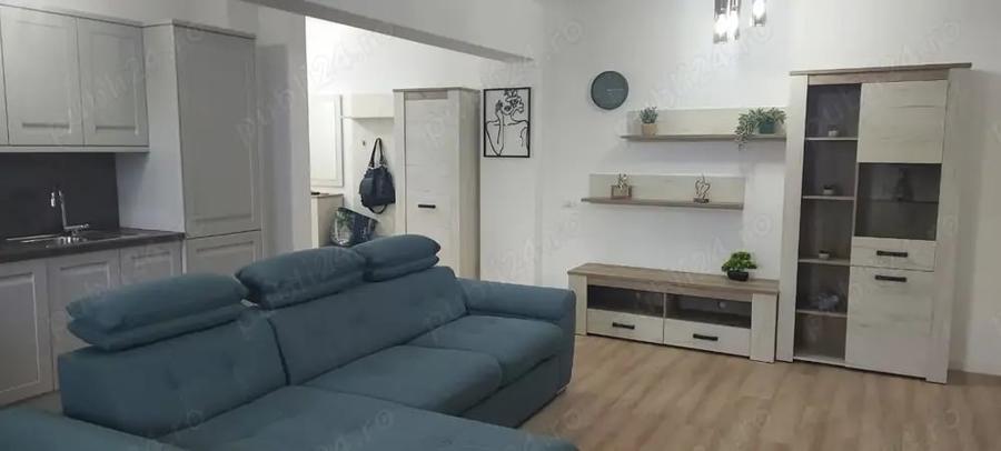 Apartament cu 2 camere semidecomandat, mobilat în Central