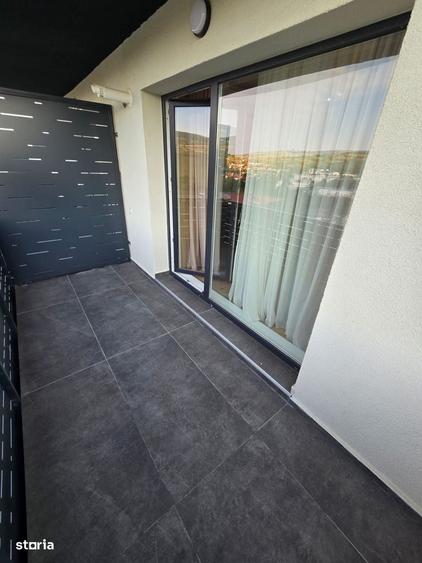 Prima inchiriere - Apartament 2 camere -Loc de parcare subteran inclus - 4