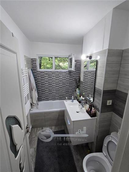 Apartament cu 2 camere semidecomandat în Podu Roș