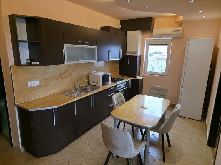 Apartament cu 2 camere decomandat în UTA
