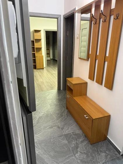 Apartament cu 2 camere semidecomandat, mobilat în Podu Roș