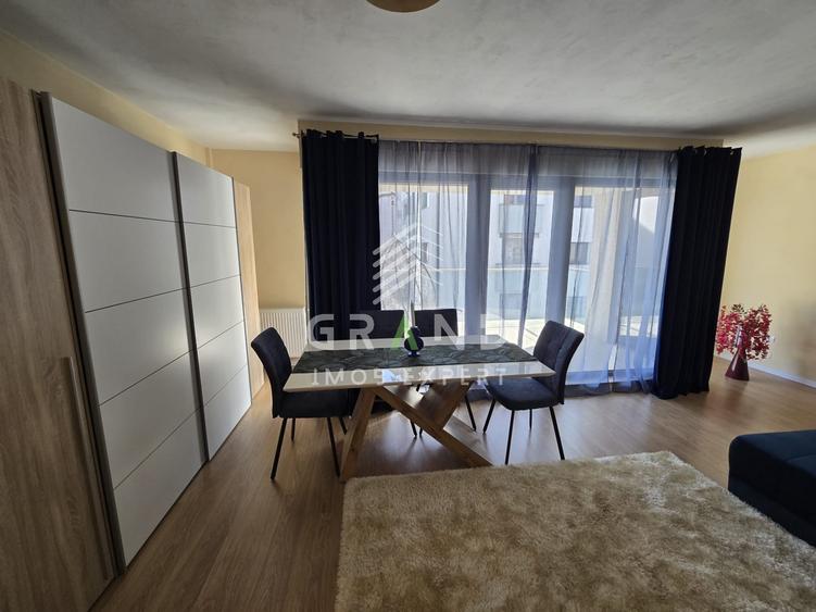 Apartament cu 2 camere semidecomandat, mobilat în Borhanci