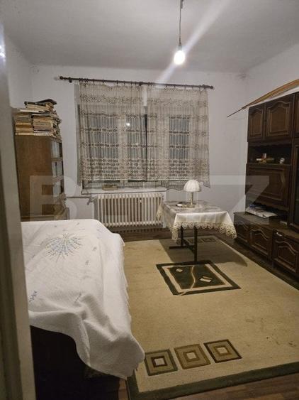 Casă individuală cu 4 camere decomandat cu Canalizare în Titulescu