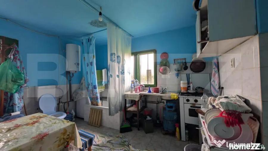 Casă cu 4 camere cu Teren 1100 Mp în Central