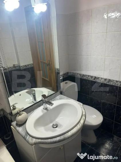 Apartament cu 4 camere semidecomandat în Calea București