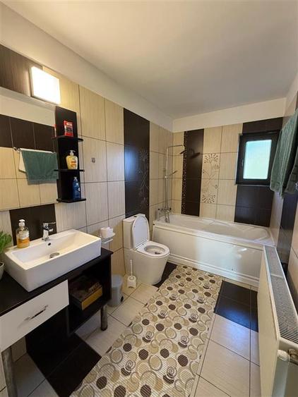 Casă individuală cu 4 camere cu Teren 900 Mp în Cug