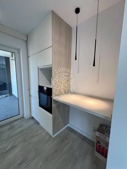Apartament cu 2 camere semidecomandat, mobilat în Calea Moldovei