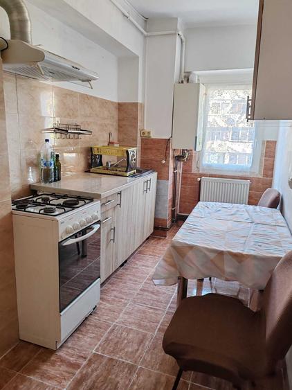 Garsonieră decomandată în Sud