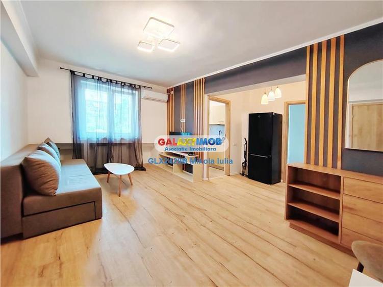 Apartament cu 3 camere semidecomandat, mobilat în Central