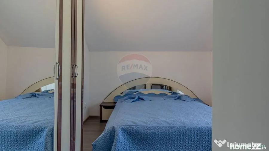 Casă cu 10 camere cu Teren 1074 Mp în Moieciu