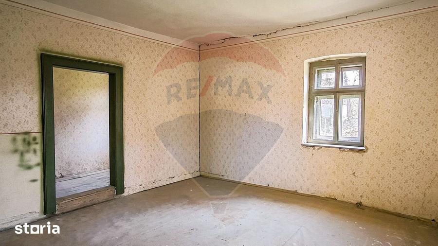 Casă cu 4 camere cu Teren 1345 Mp în Bruiu