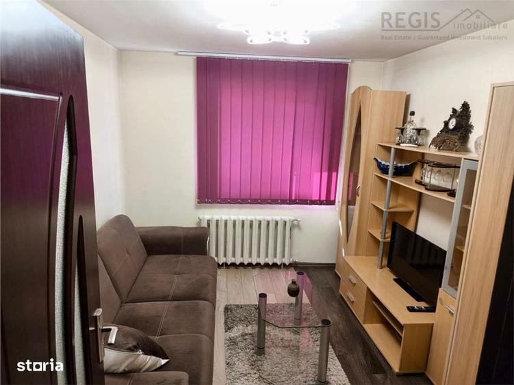 Apartament cu 3 camere decomandat în Tractorul