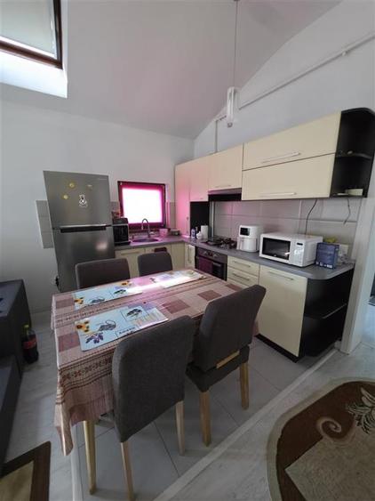 Apartament cu 2 camere decomandat, mobilat în Sânpetru